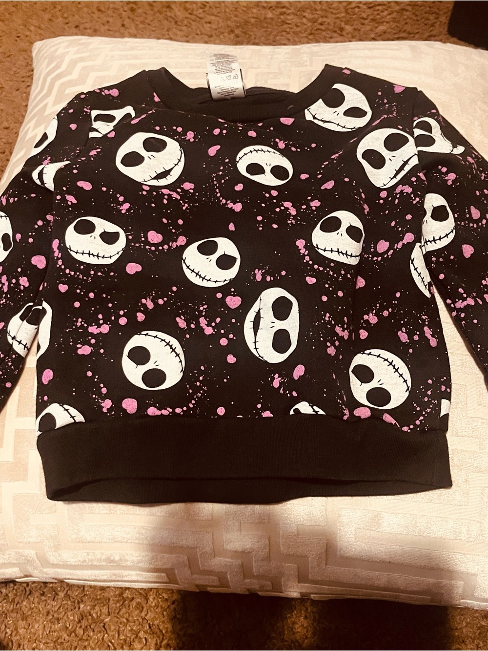 Disney Black Sweatshirt with White Skull Faces and Pink Splatter